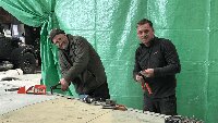 Dave and Brad riveting  new wing panels to port wing. 