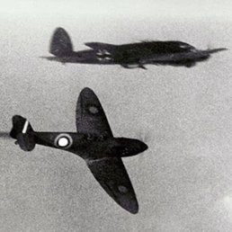 Spitfire and Luftwaffe Heinkel in combat. Spitfire and Luftwaffe Heinkel in combat.