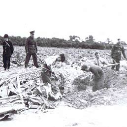 Clearing the crash site, near Sandwich, Kent of Me109E-3, of the 3rd Staffel of Lehrgeschwader 2.